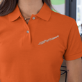 Load image into Gallery viewer, Polo Shirt Orange Paris Airplane
